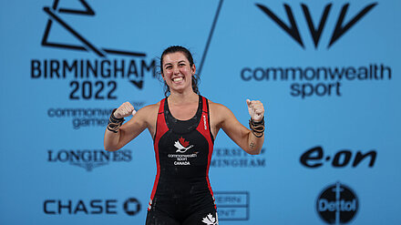What We Have Learnt from the Commonwealth Games Female swimmer celebrates at the Commonwealth Games.