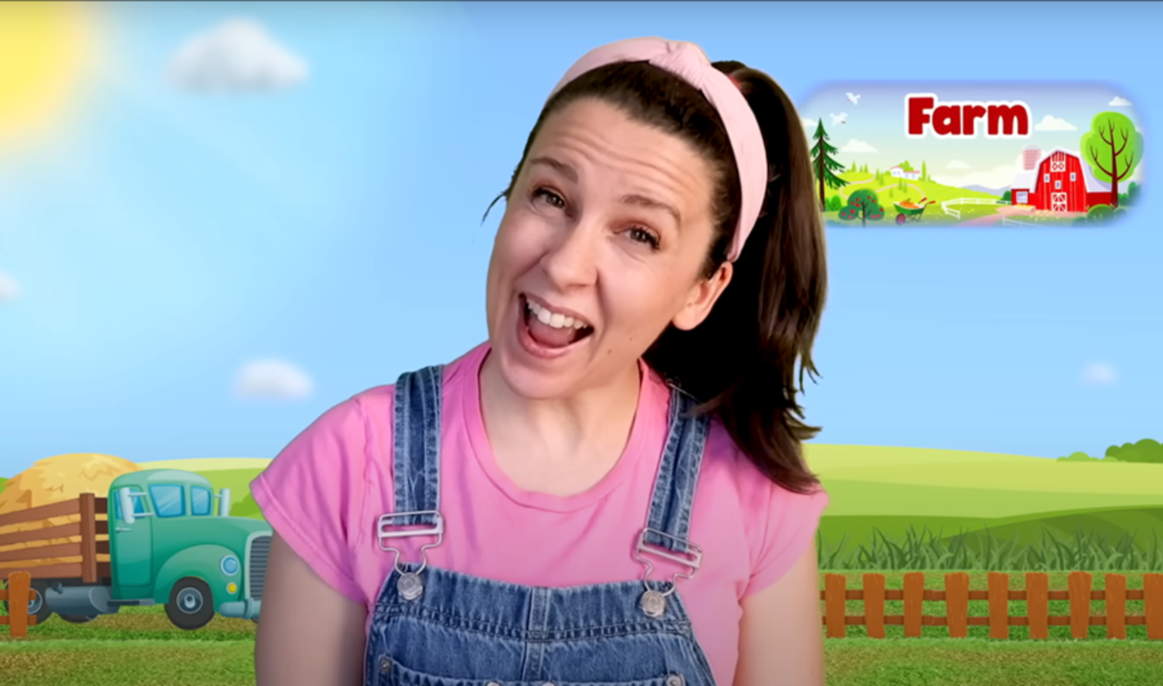 YouTube and TikTok presenter Ms Rachel smiles into the camera and in the background is an illustration of green fields, a tractor and a farm.