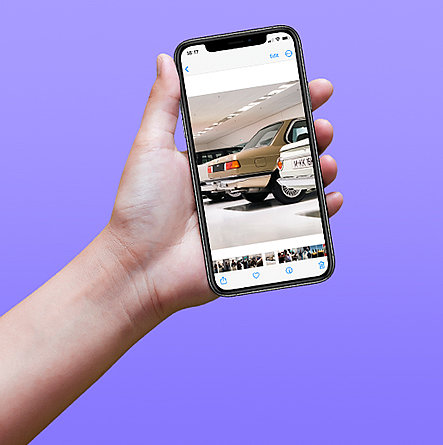 Bild von Oldtimern auf Smartphone
