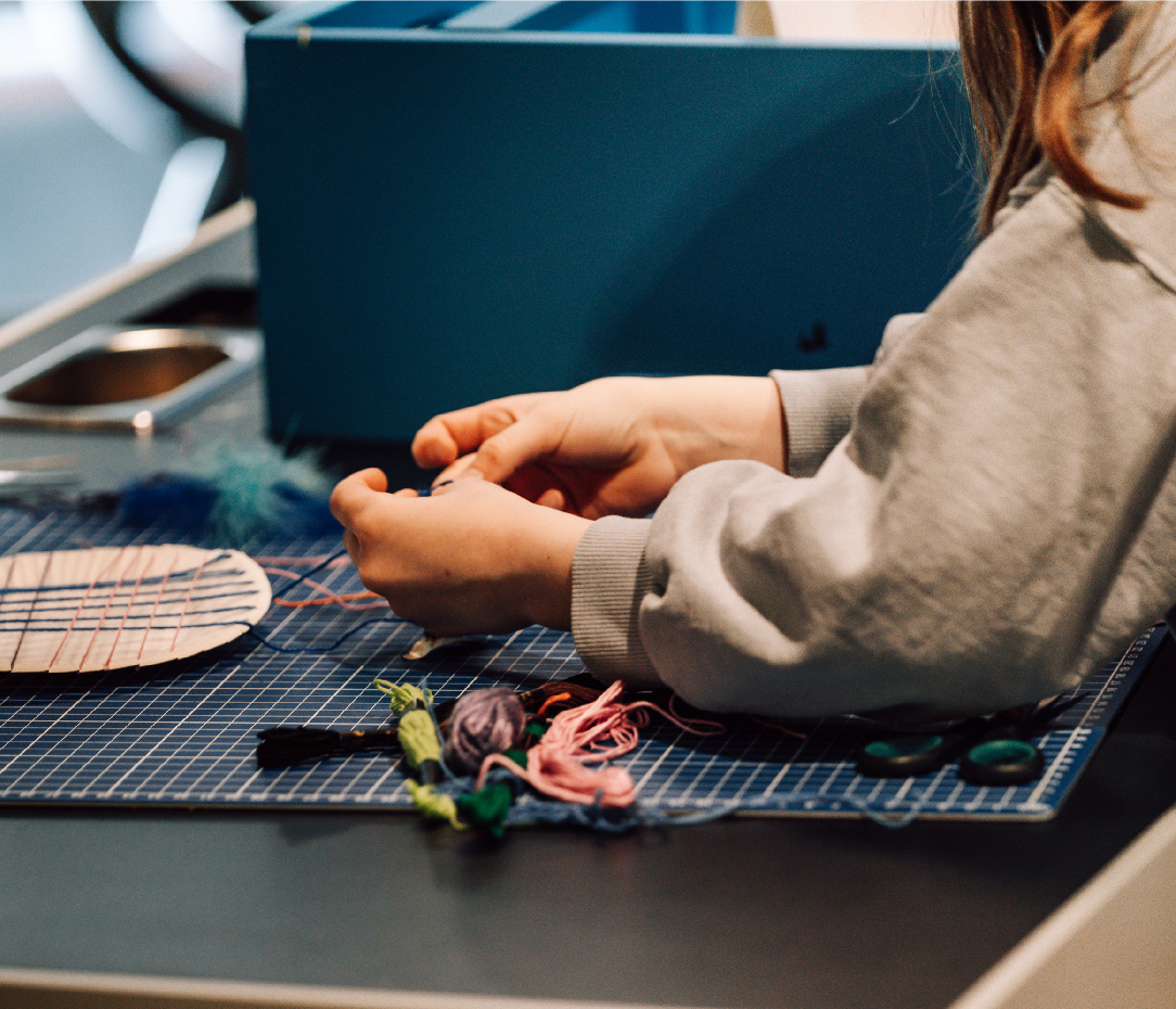 Child builds a circuit at the BMW The Campus Workshop.